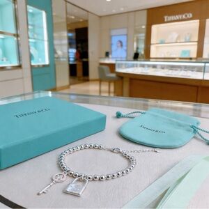 Tiffany & Co. Silver Bracelet with Key and Lock Charms